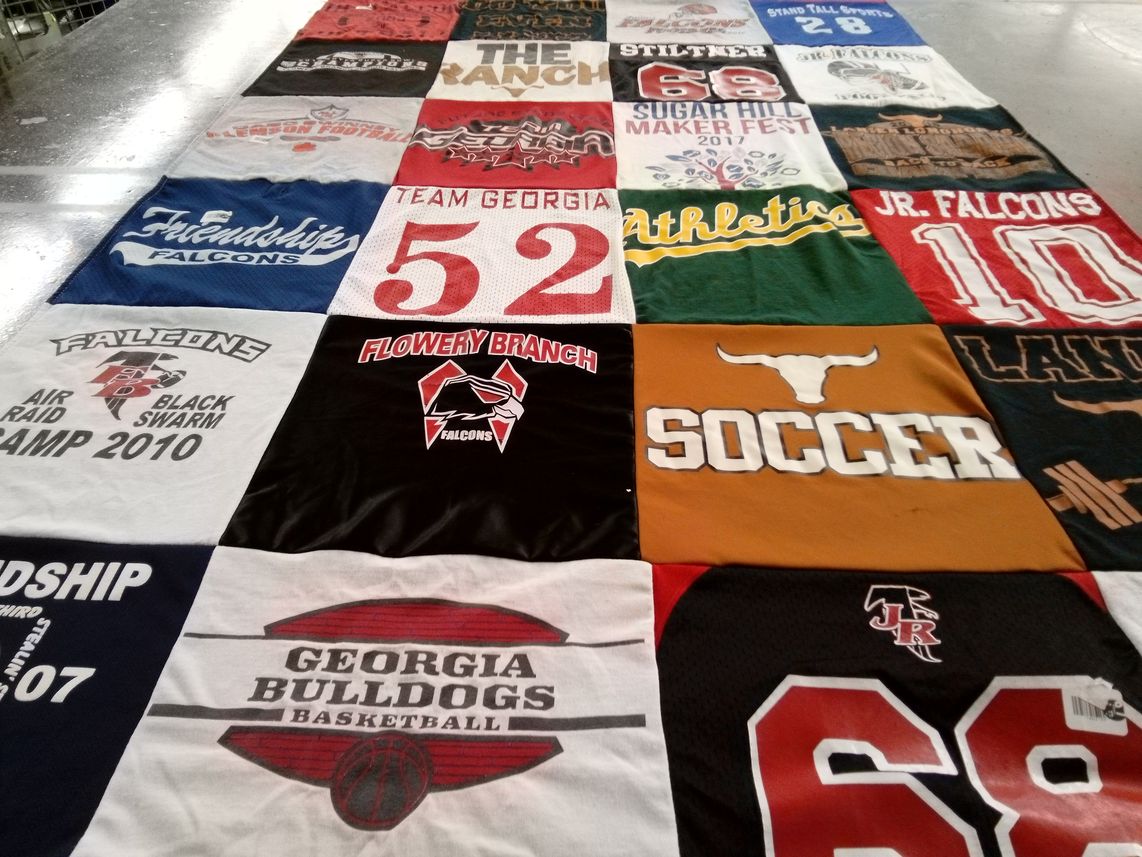 T-shirt quilt featuring flowery branch falcons, georgia bulldogs basketball by Brian from GA