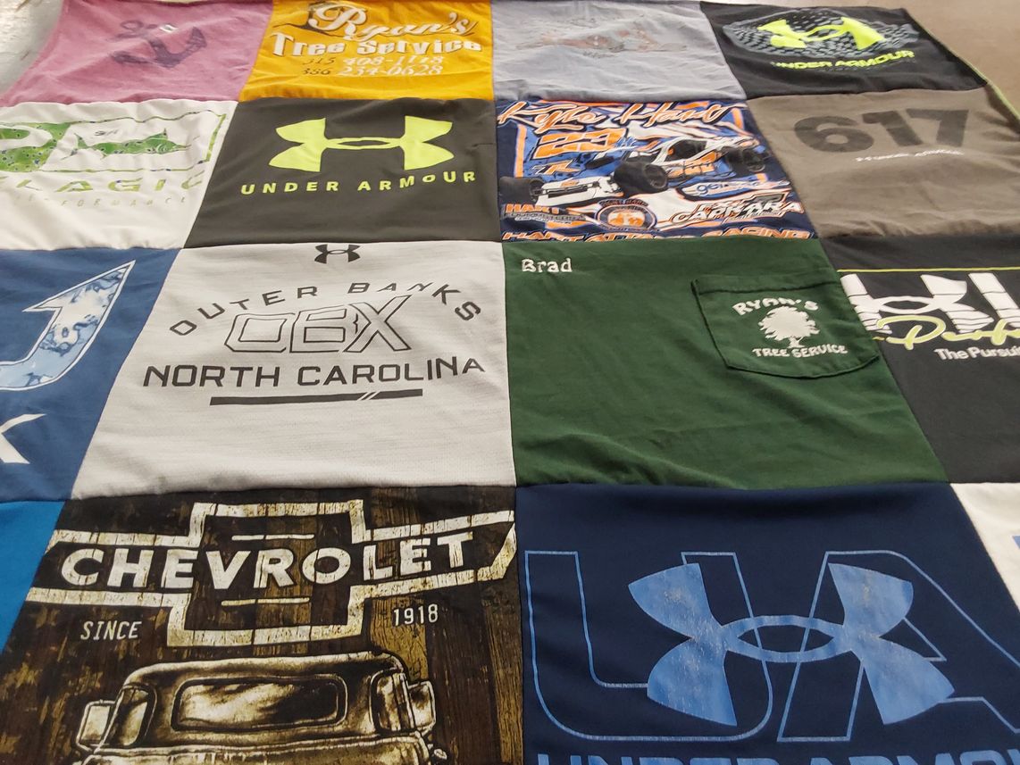 T-shirt quilt with racing, sports themes by Tammy from NY
