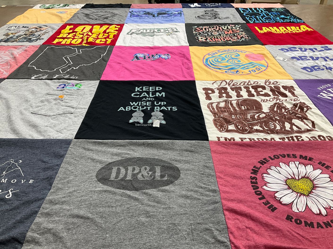 T-shirt quilt with cultural, humor themes by Kelly from OH