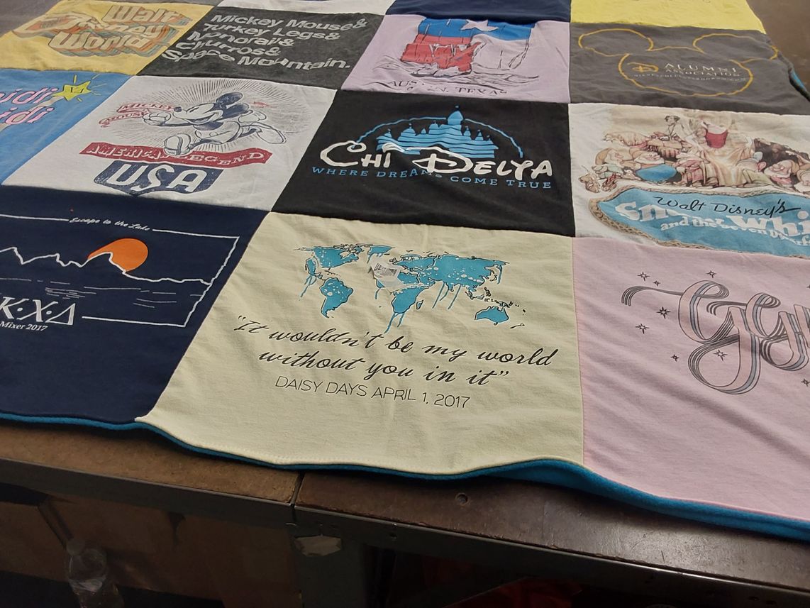 T-shirt quilt with disney, travel themes by SUANNE from TX