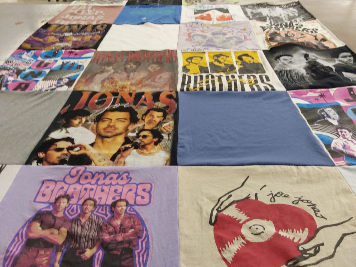 T-shirt quilt with music, pop culture themes by Joshua from FL