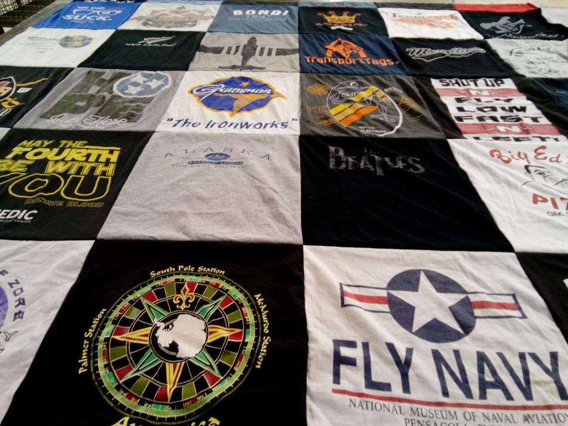 T-shirt quilt with music, aviation themes by Greg from TN
