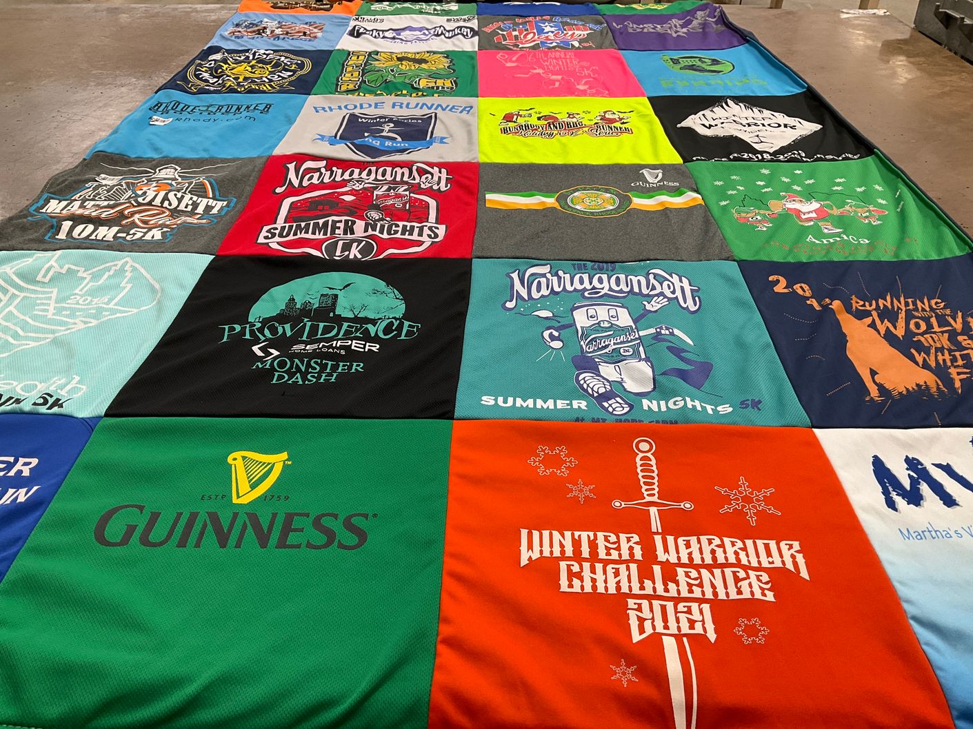 T-shirt quilt with running, events themes by Nancy from RI