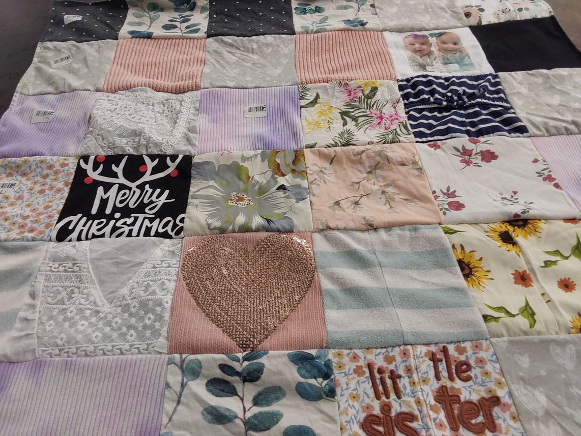 T-shirt quilt with family, holiday themes by Emily from NY