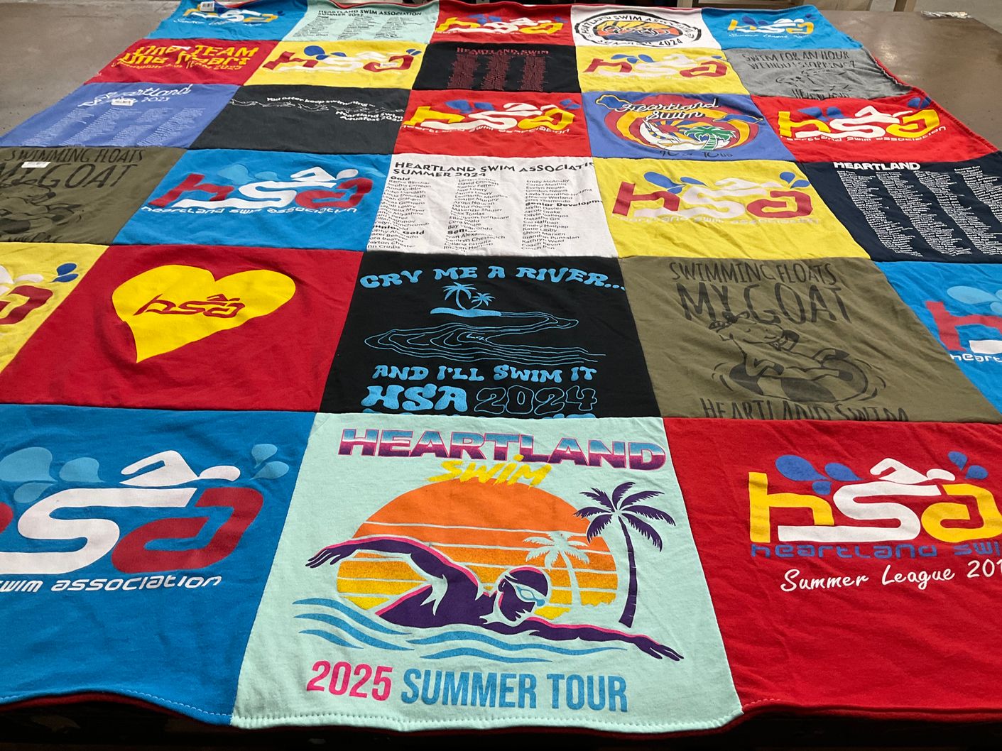 T-shirt quilt with swimming, sports themes by Andrea from CA