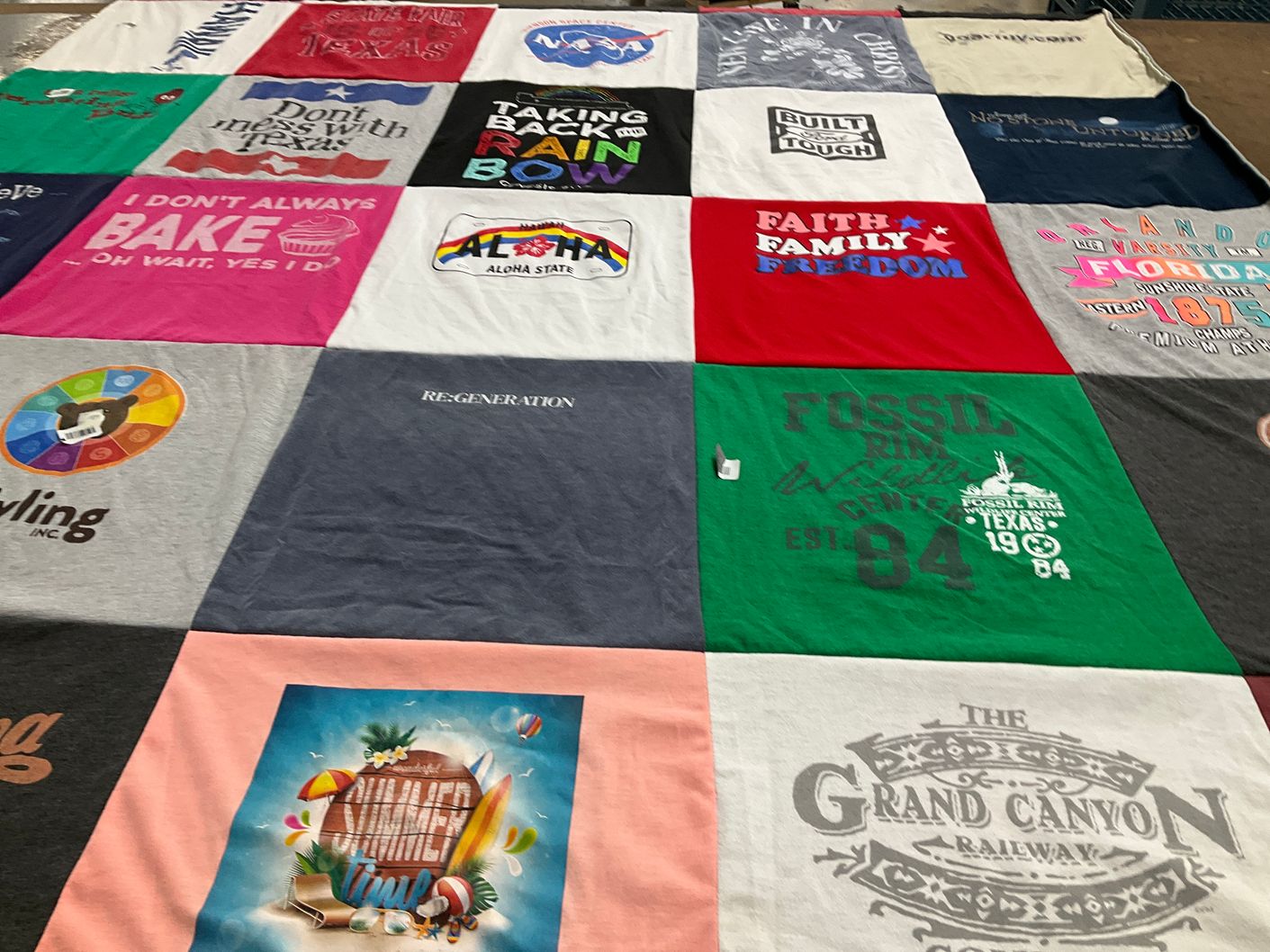 T-shirt quilt with baking, adventure themes by LAURA from TX