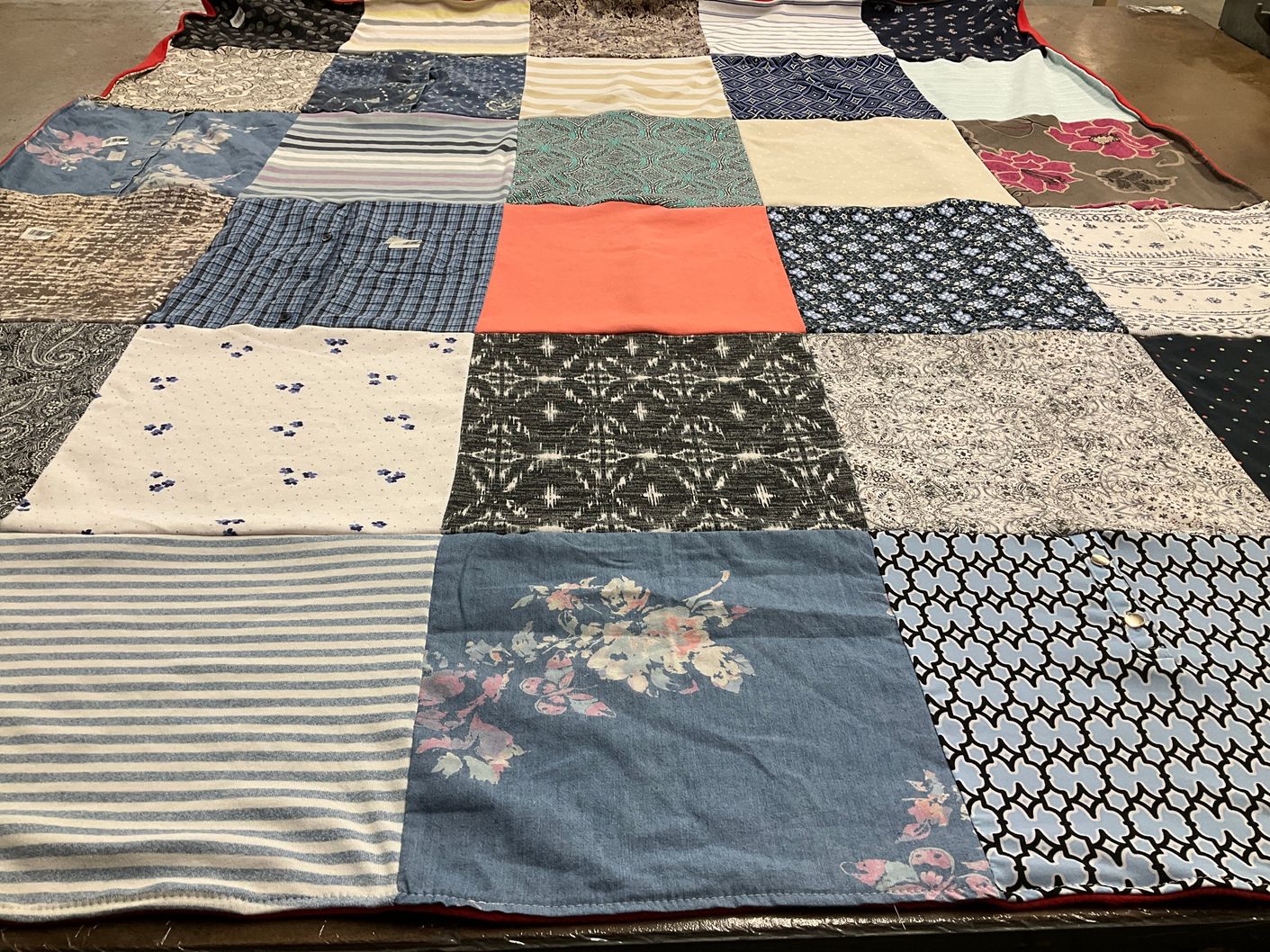 T-shirt quilt with quilting, textiles themes by Lelah from MO
