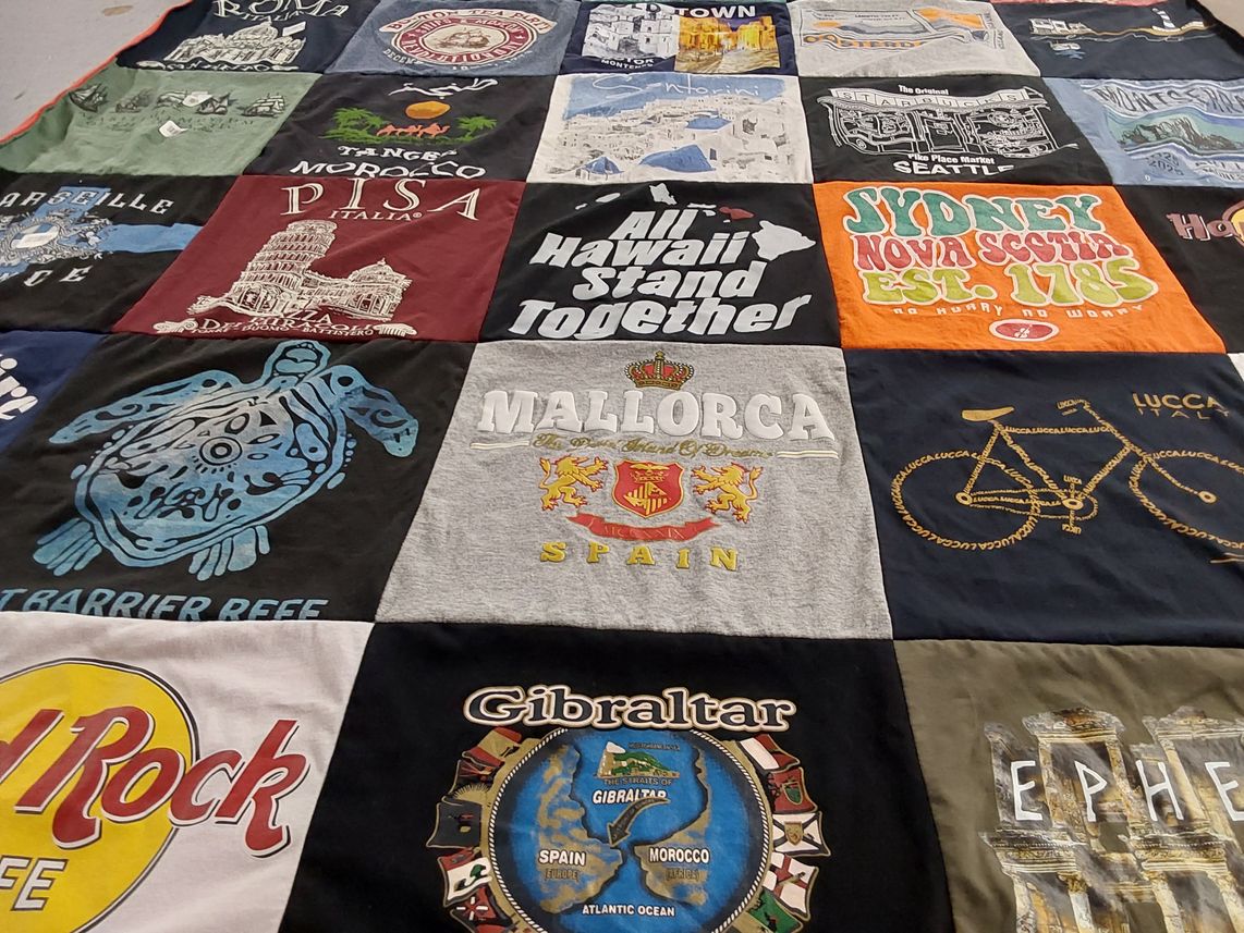 T-shirt quilt with travel, culture themes by Kenneth from WA