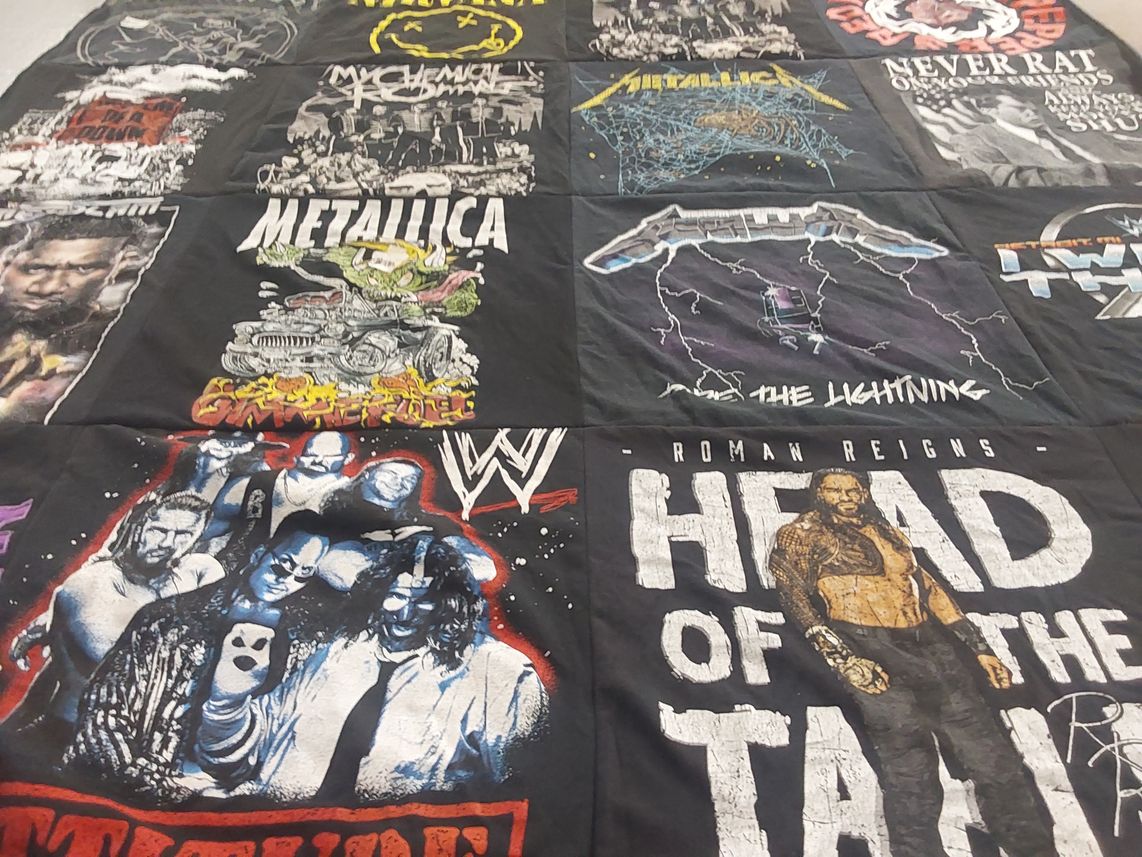 T-shirt quilt with music, wrestling themes by Leticia from IL