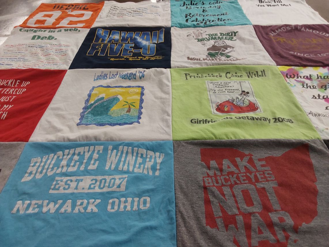 T-shirt quilt with travel, wine themes by Debbie from OH