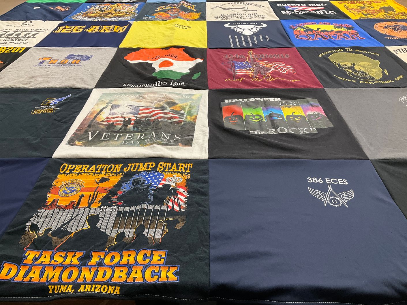 T-shirt quilt with military, veterans themes by elise from IL