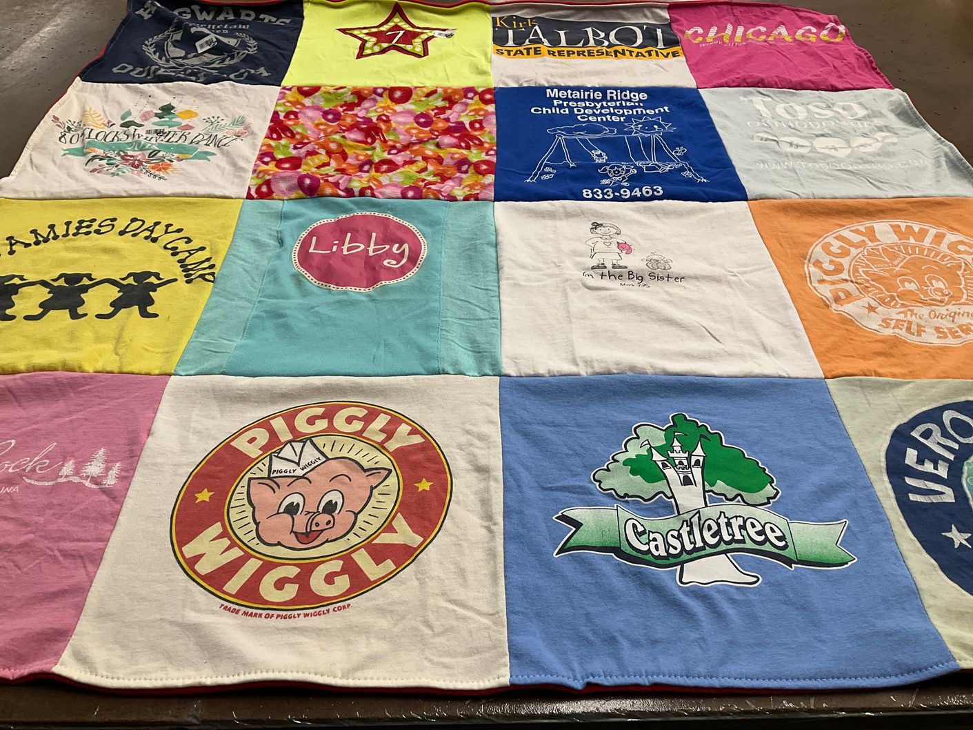T-shirt quilt with camping, community service themes by elizabeth from LA