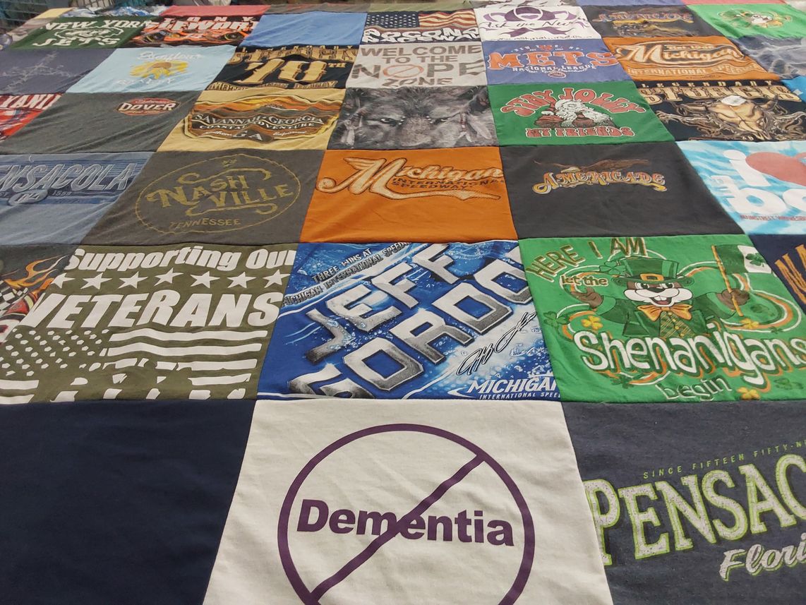T-shirt quilt with supporting veterans, travel themes by Dennis from NY