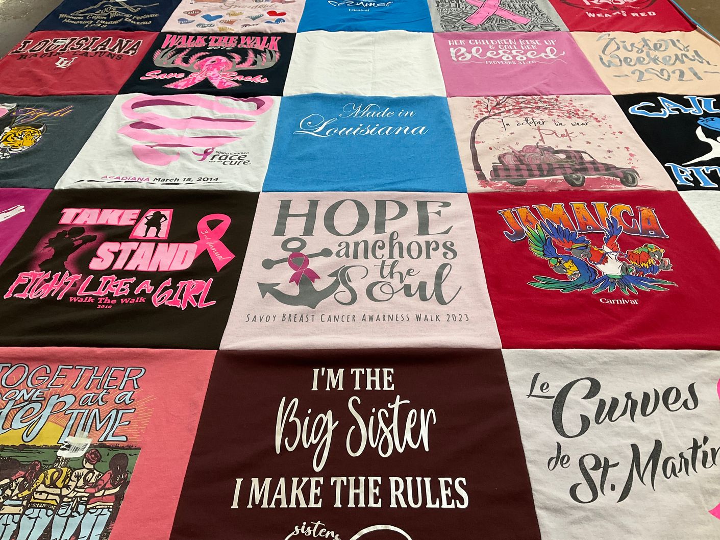 T-shirt quilt with breast cancer awareness, sisterhood themes by Virginia from LA