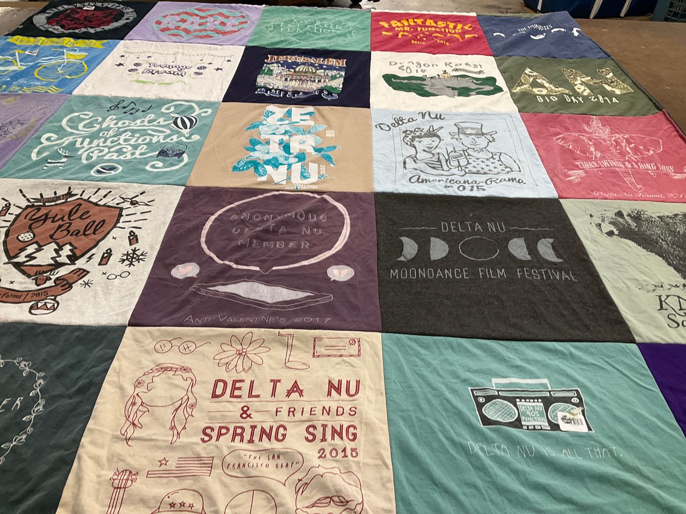 T-shirt quilt with film festivals, social events themes by Lee from TN