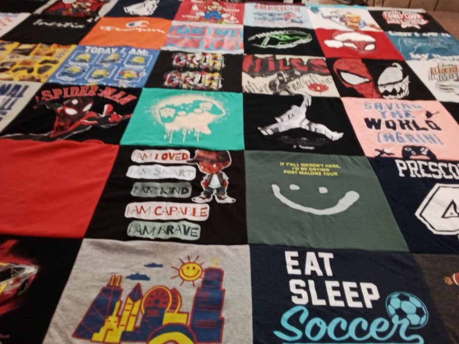 T-shirt quilt with superheroes, sports themes by Tiphani from IL