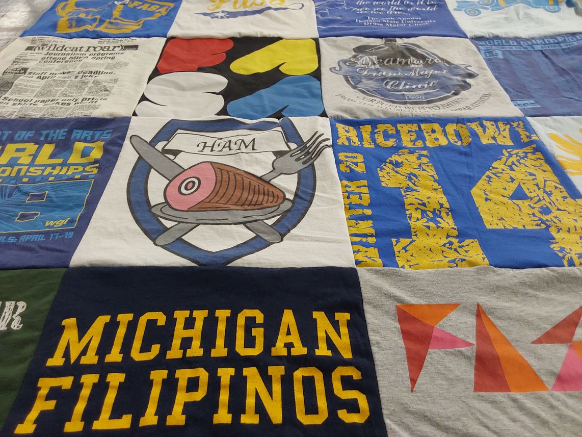T-shirt quilt with world championships, the arts themes by May from MI