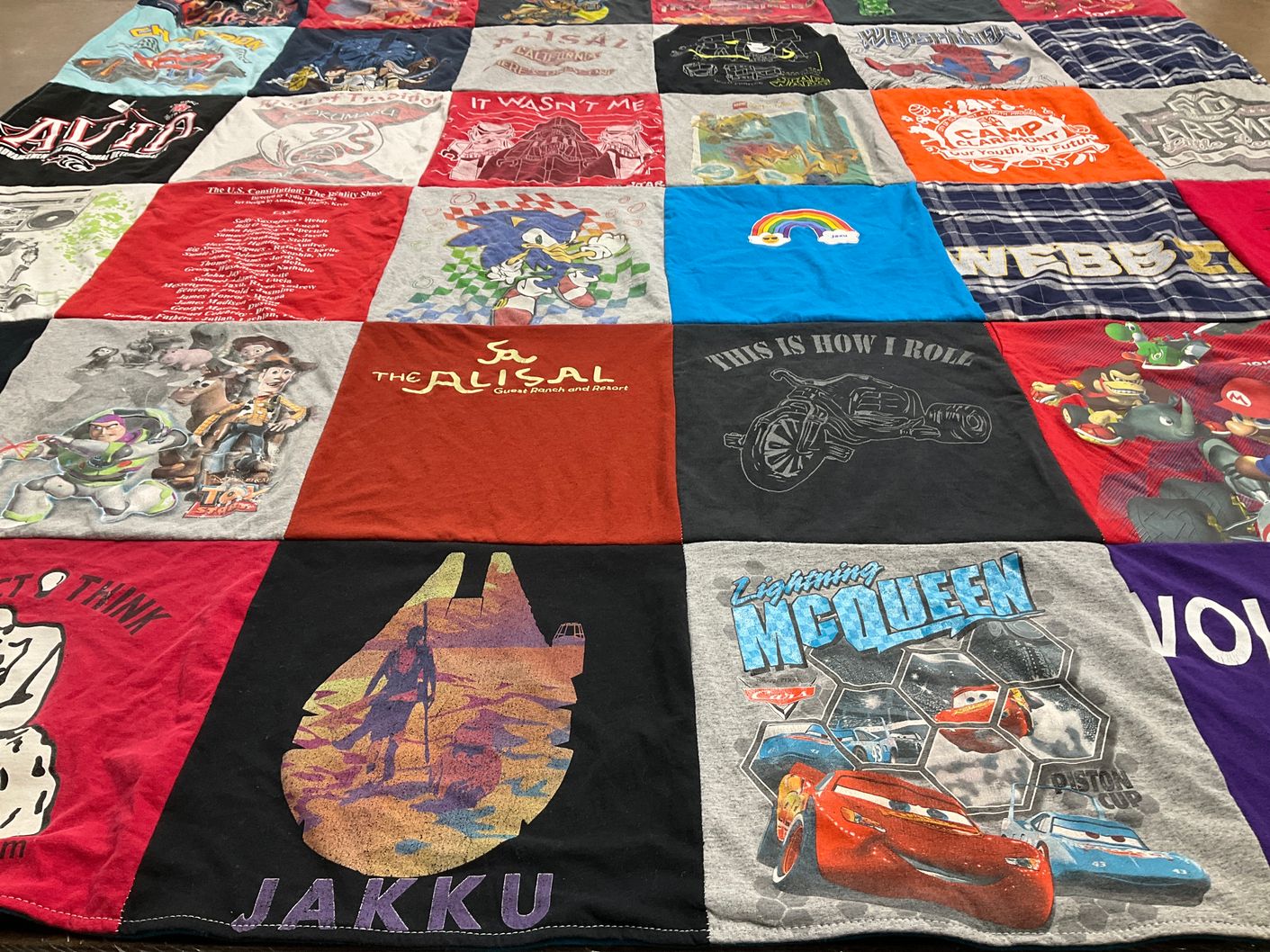 T-shirt quilt with animated movies, cartoons themes by Heather from CA