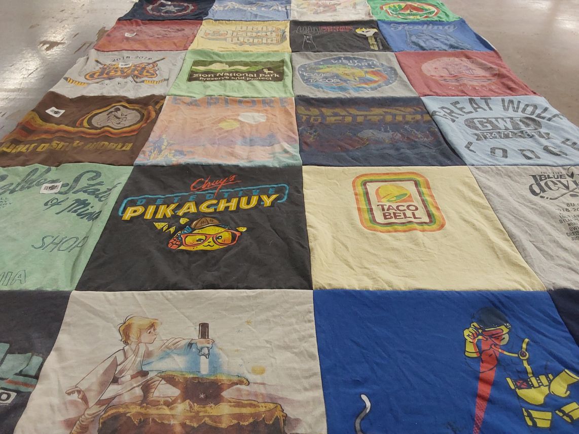T-shirt quilt with gaming, food themes by Elise from CA