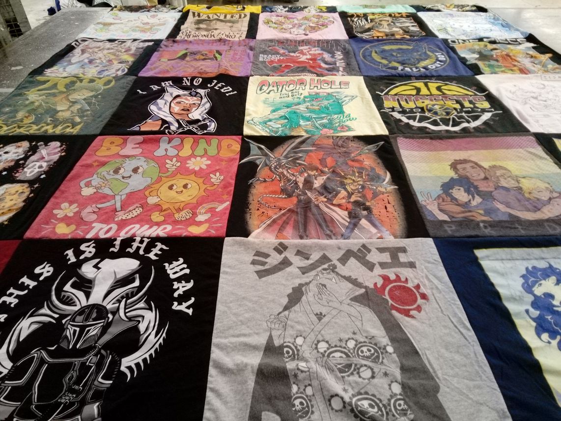 T-shirt quilt with anime, star wars themes by Leah from NC