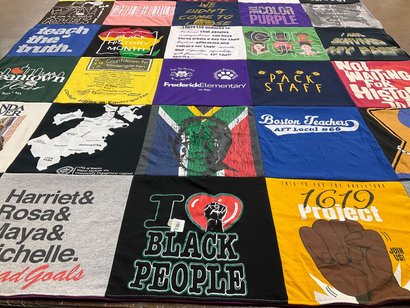 T-shirt quilt with education, history themes by Deidre from MA