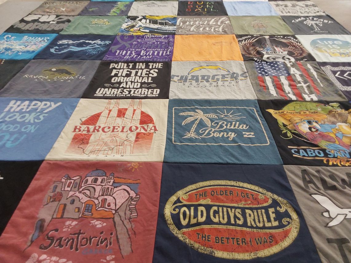 T-shirt quilt with travel, vacation themes by Karen from AZ