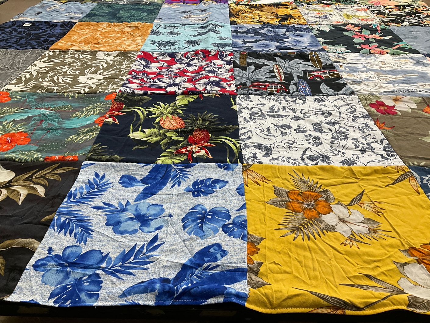 T-shirt quilt with floral designs, tropical patterns themes by Kris from IA