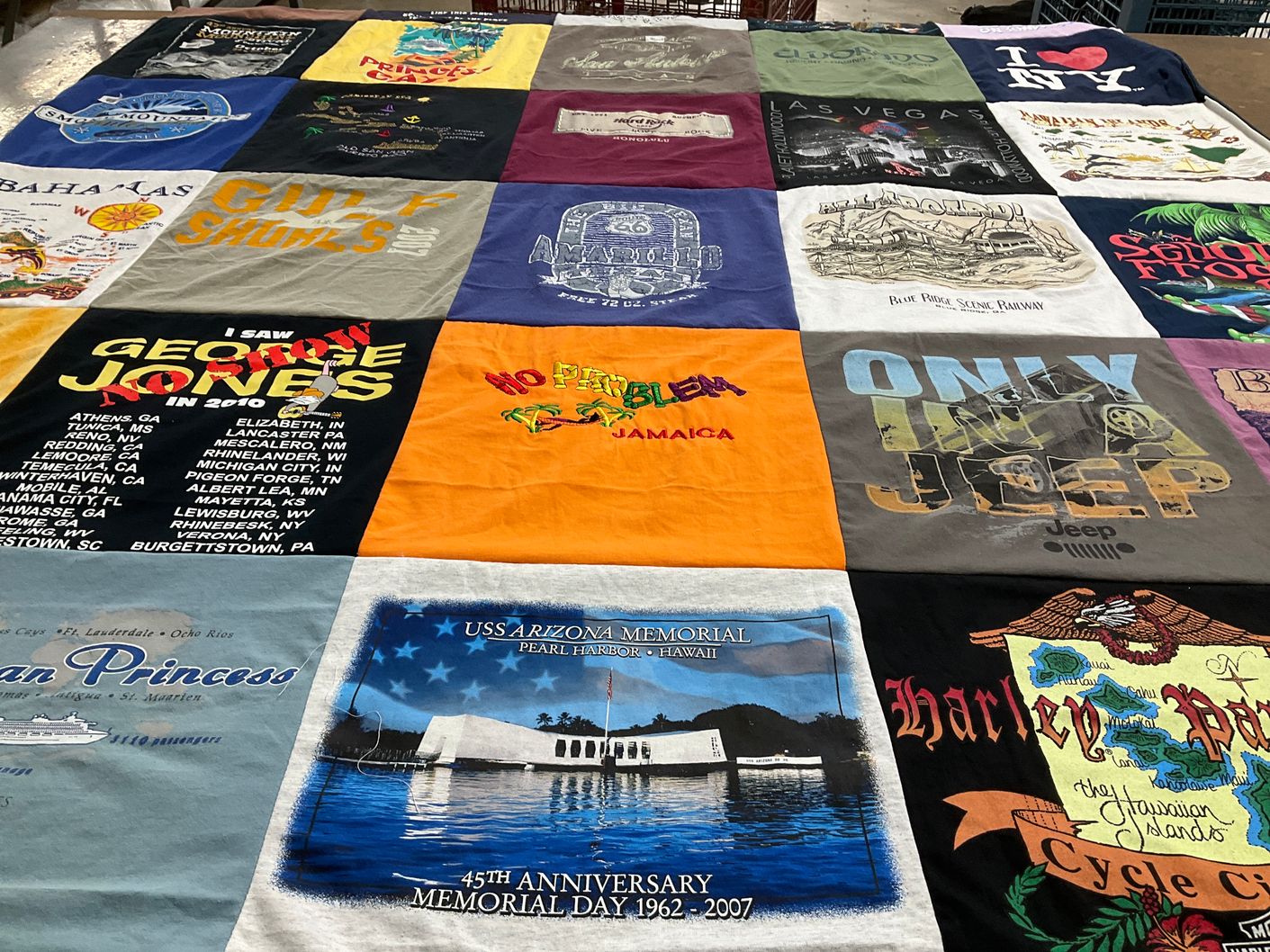 T-shirt quilt with travel, music themes by Kimberly from GA