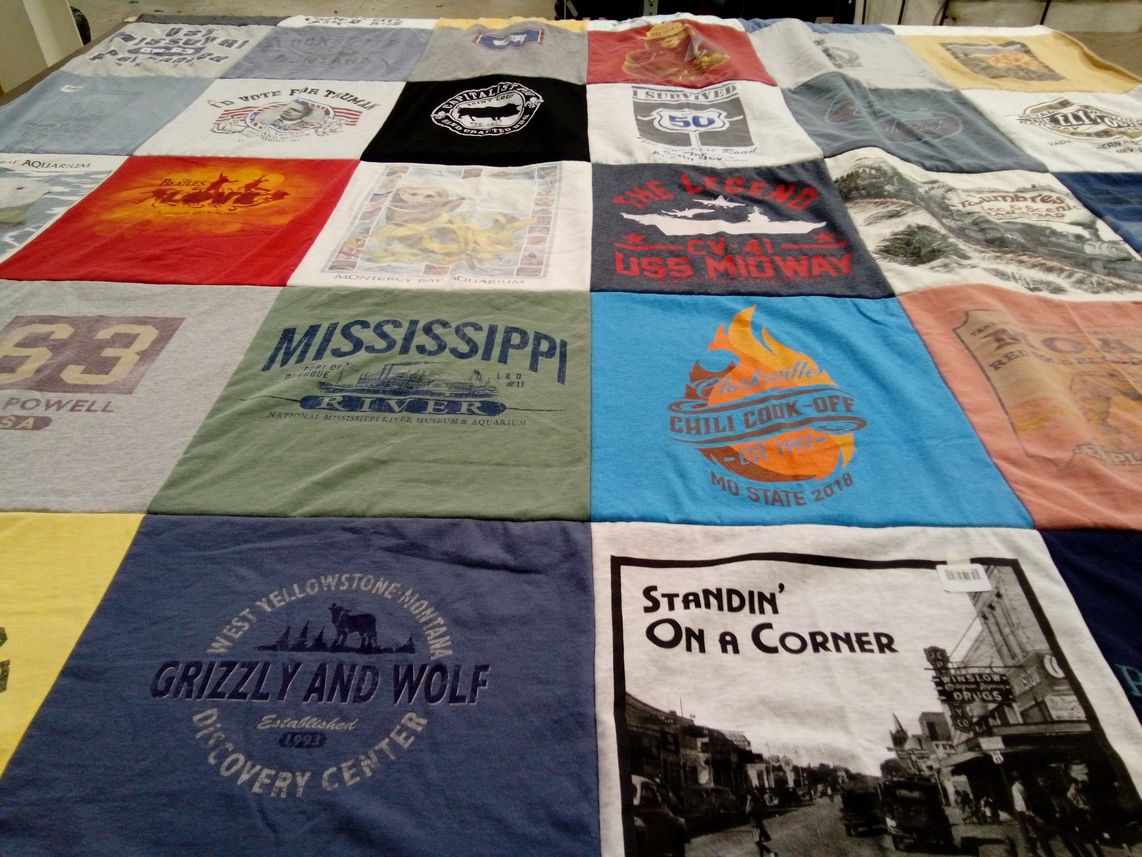 T-shirt quilt with travel, cuisine themes by Janet from AL