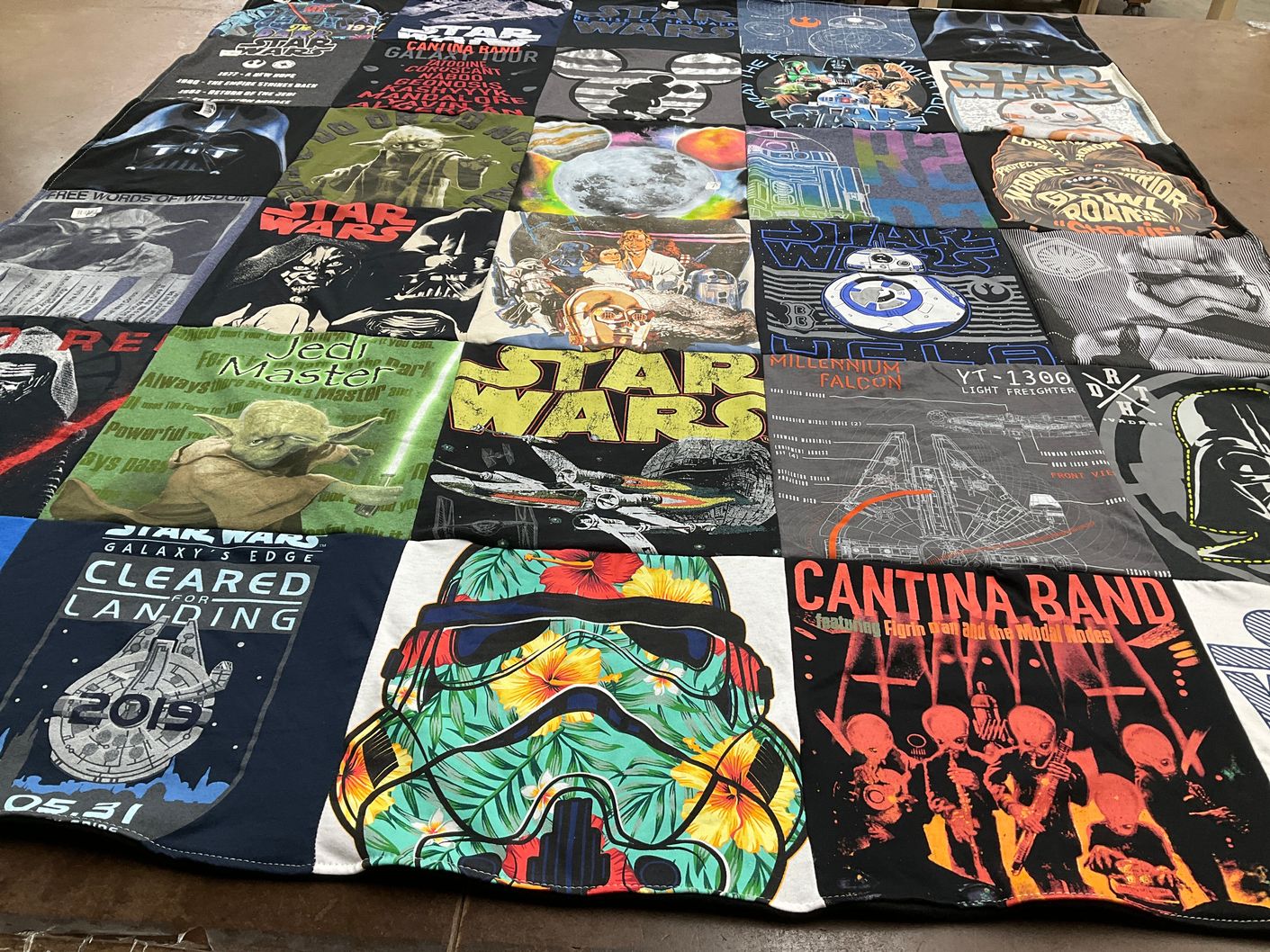 T-shirt quilt with star wars, sci-fi themes by Kelleen from CA