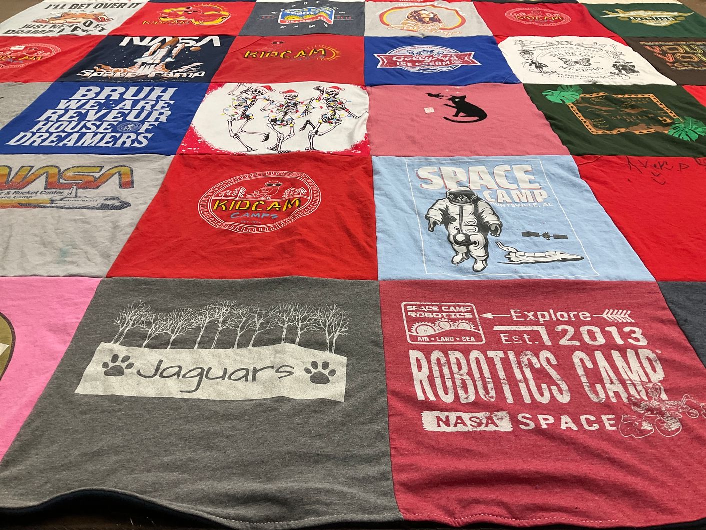 T-shirt quilt with space exploration, education themes by JAMIE from AL