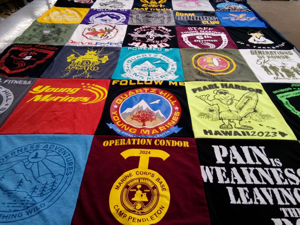 T-shirt quilt with military, fitness themes by Irene from CA