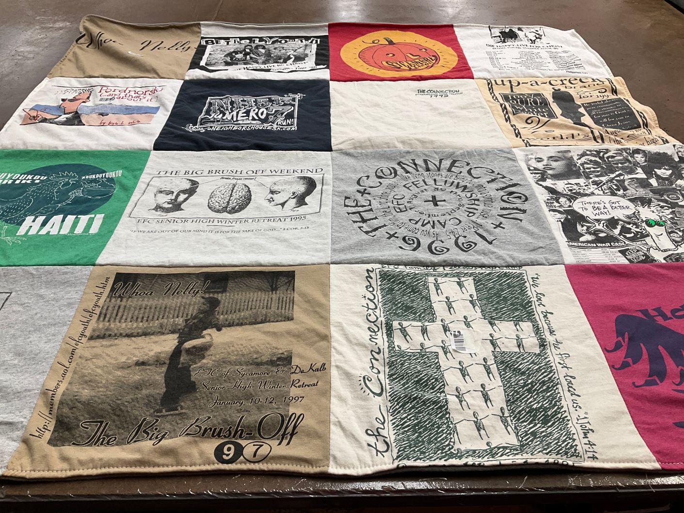 T-shirt quilt with community service, youth retreats themes by Barb from IL