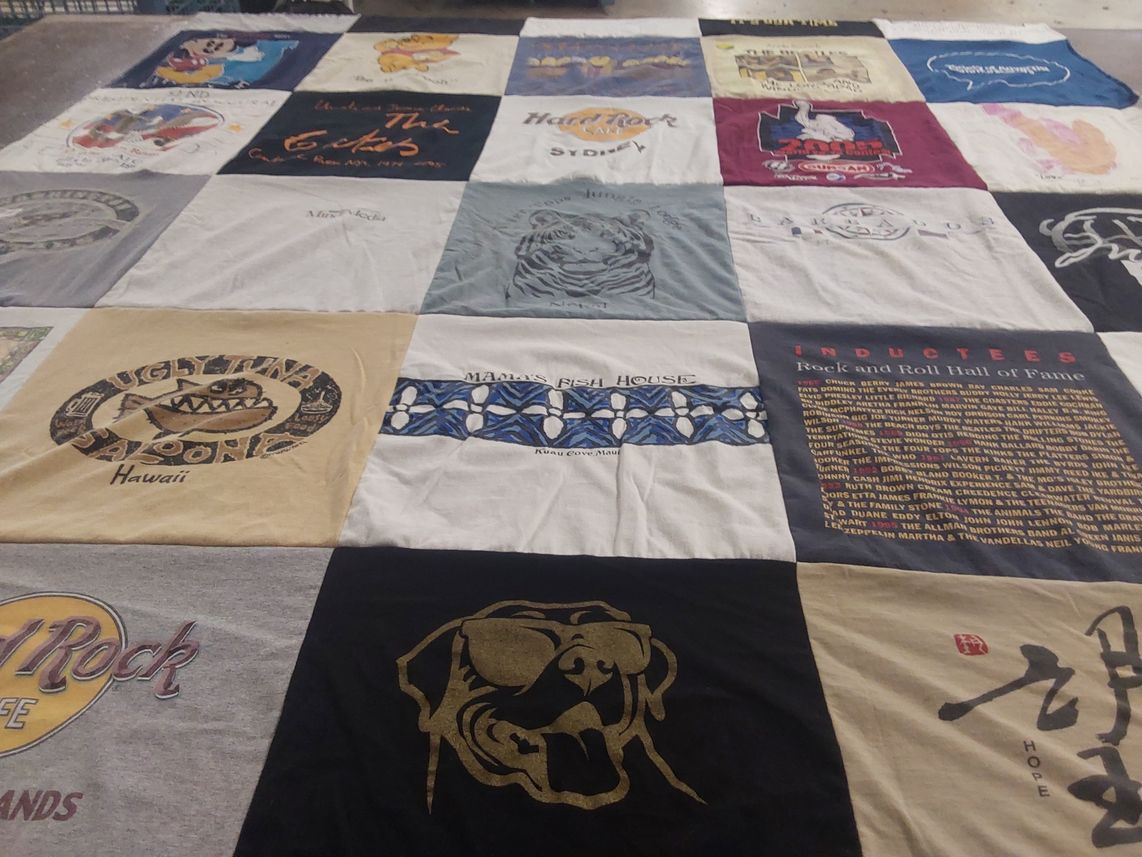 T-shirt quilt with music, travel themes by Raymond from CA