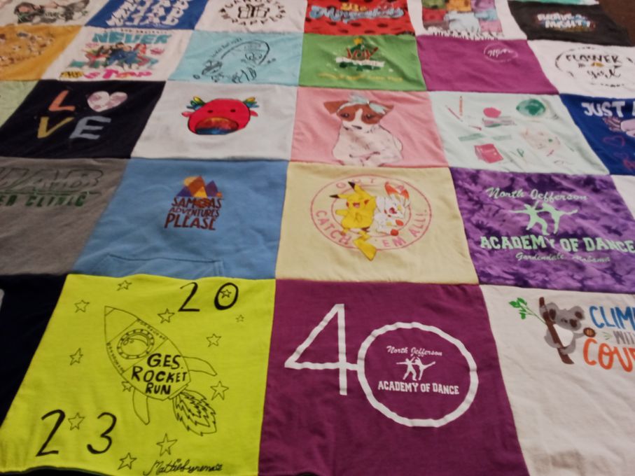 T-shirt quilt with dance, pets themes by Carla from AL