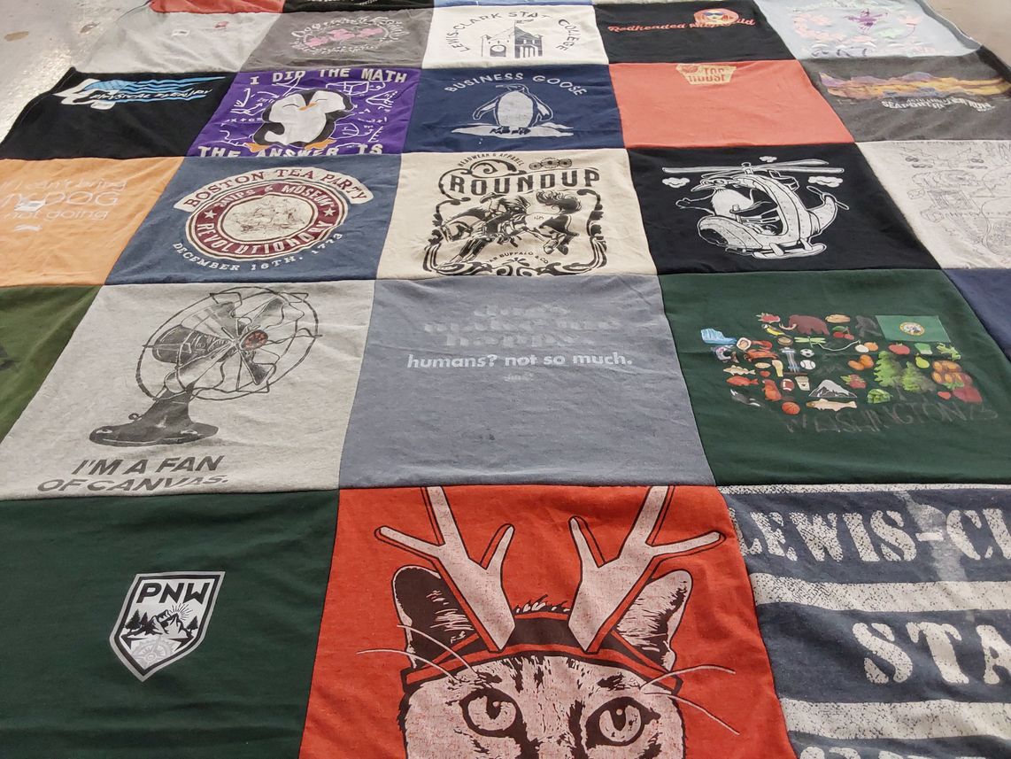 T-shirt quilt with outdoors, history themes by Carrie from ID