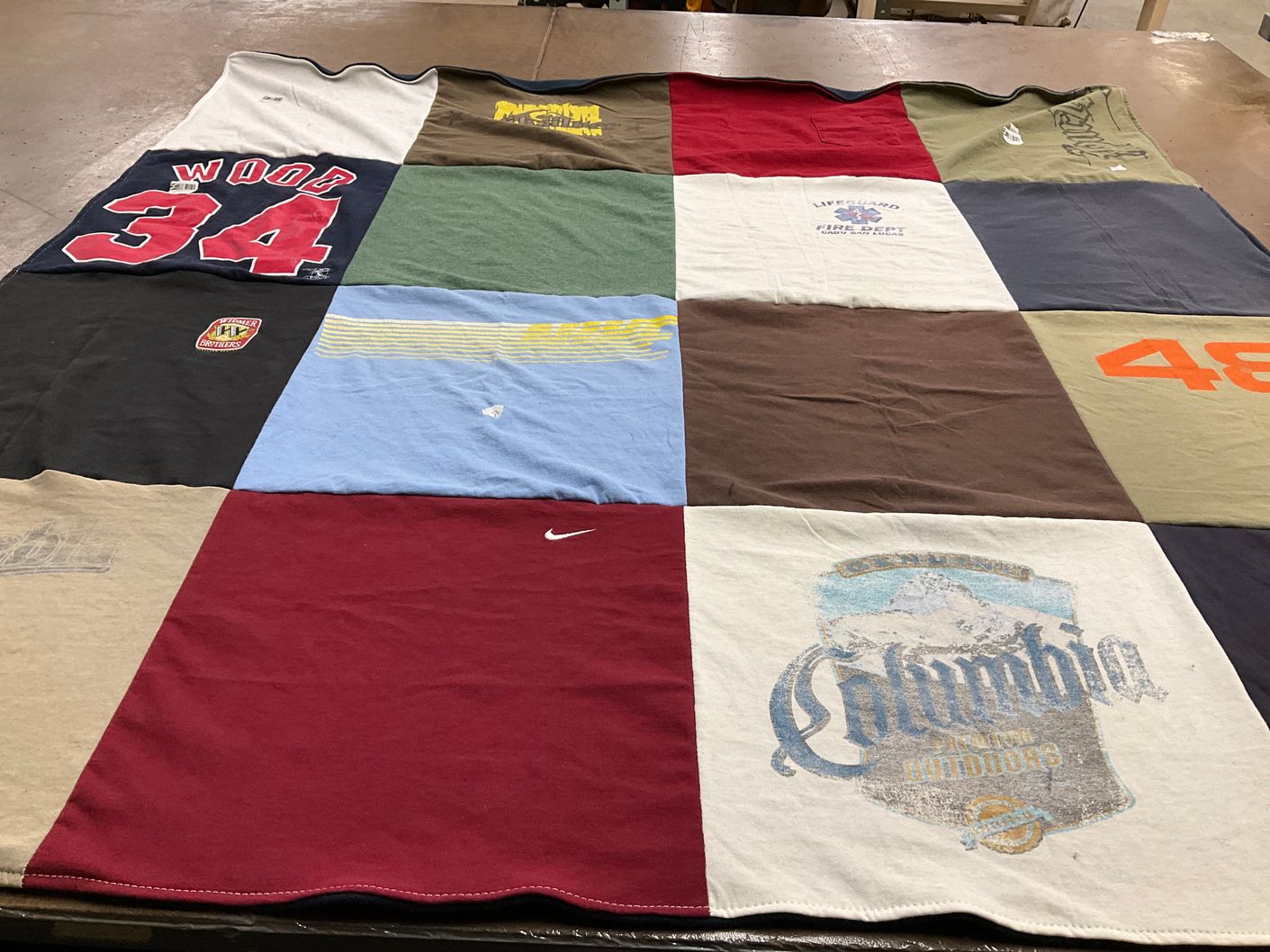 T-shirt quilt with outdoors, sports themes by Kassi from CO
