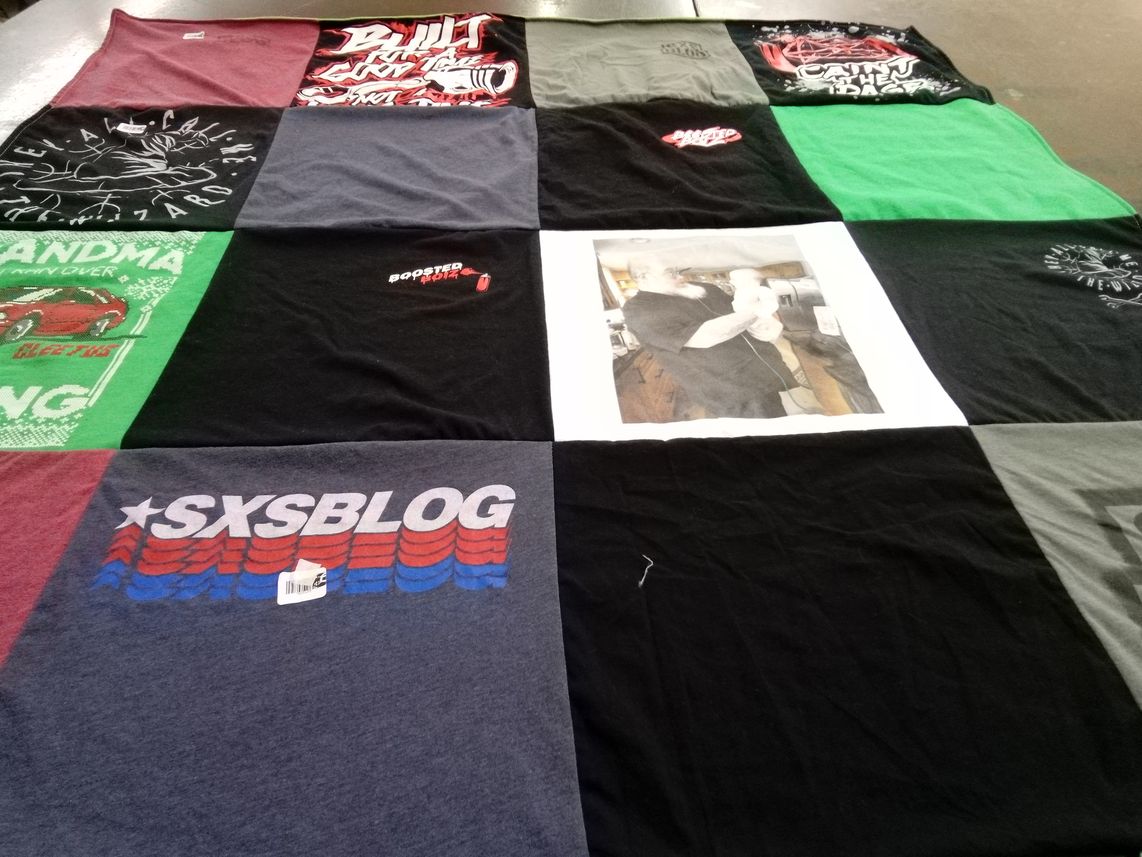 T-shirt quilt with automotive, motorsports themes by Lucille from MI