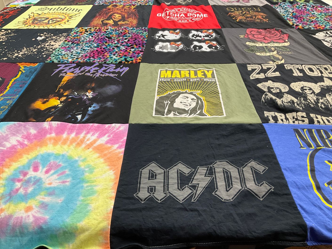 T-shirt quilt with music, rock themes by Sara from TX