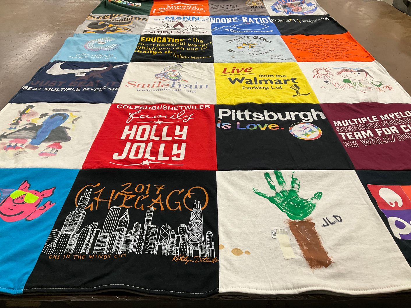 T-shirt quilt with charity, education themes by james from KY