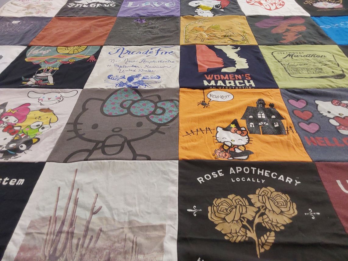 T-shirt quilt with music, activism themes by Kristina from CO