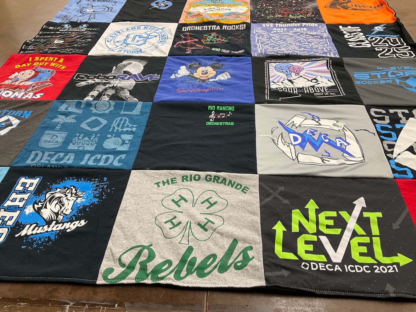 T-shirt quilt featuring cleveland high school soccer, rio rancho high school orchestra by April from NM
