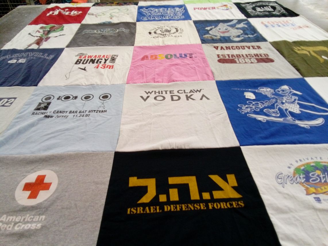 T-shirt quilt with travel, events themes by Adam from GA