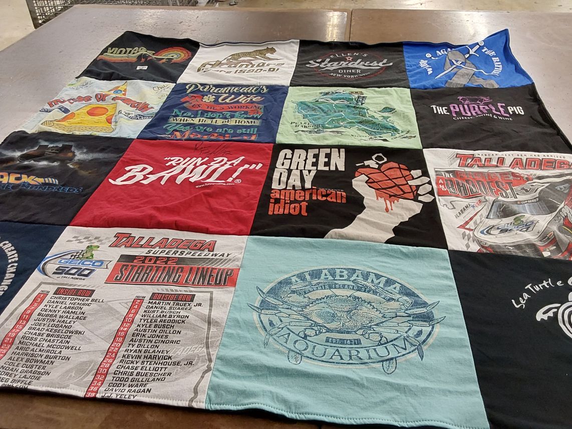 T-shirt quilt with nascar, music themes by April from TN