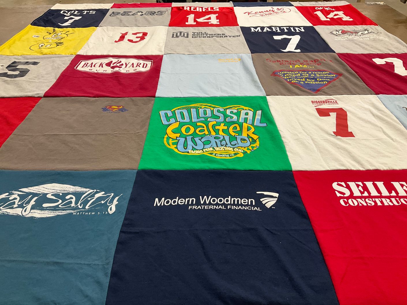 T-shirt quilt with sports, amusement parks themes by Starr from MS