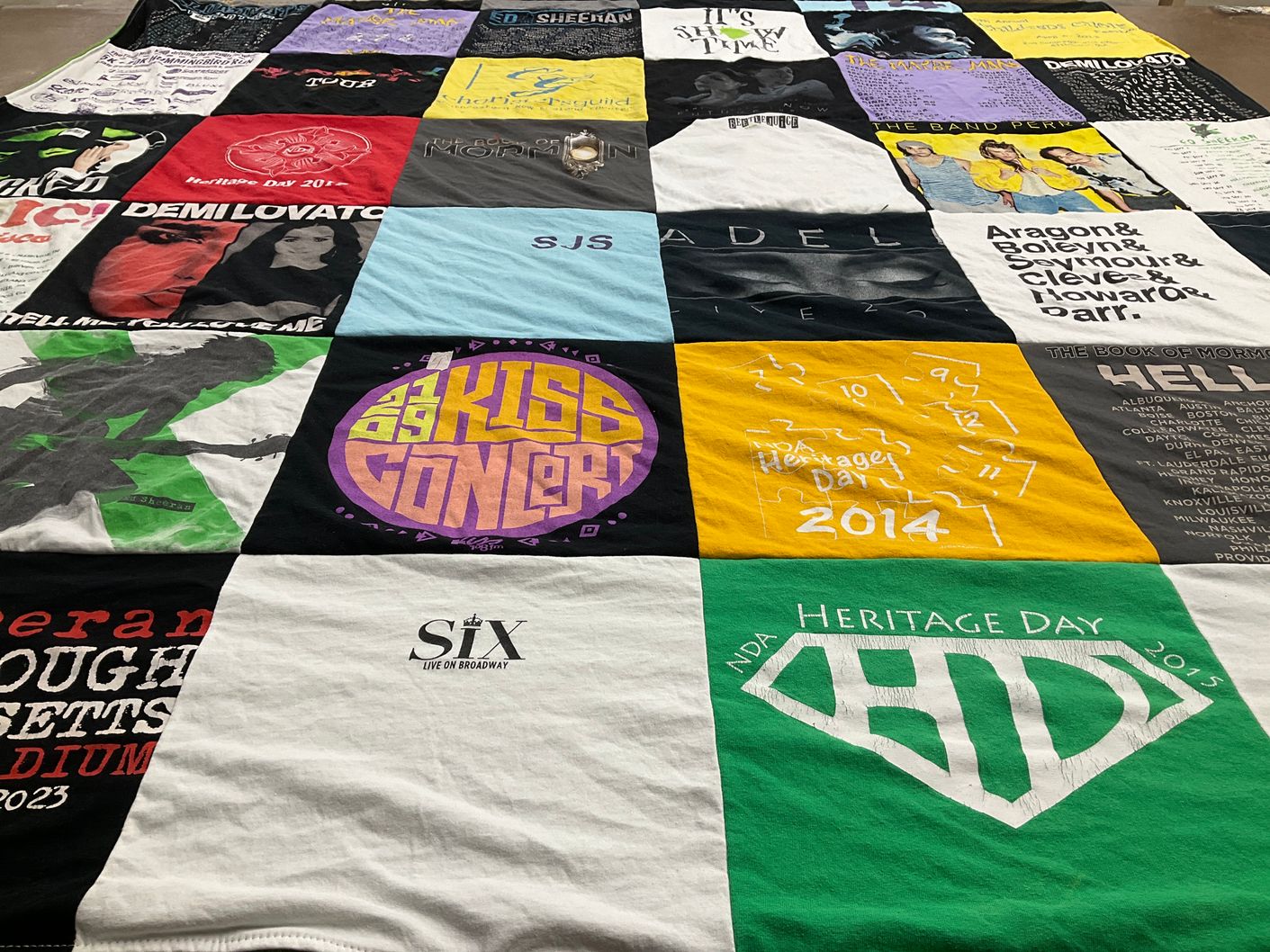 T-shirt quilt with music, theater themes by Kara from MA