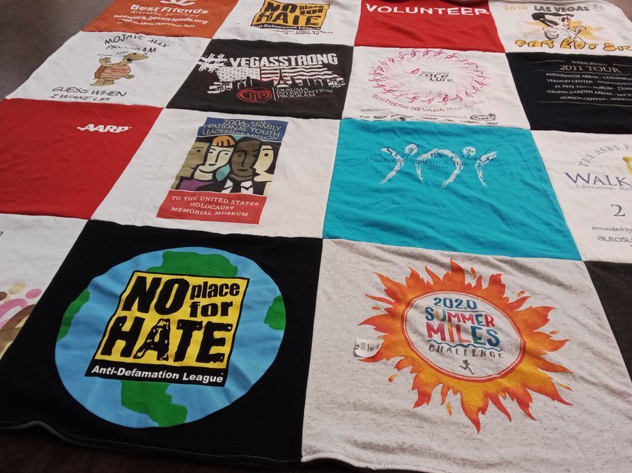 T-shirt quilt with community service, social justice themes by Risa from NV