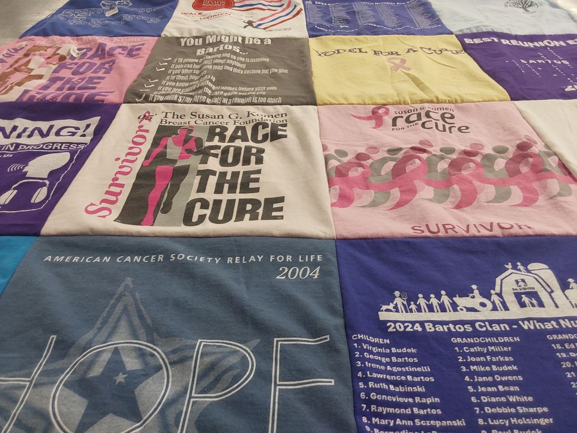 T-shirt quilt with breast cancer awareness, running themes by Jean from MI