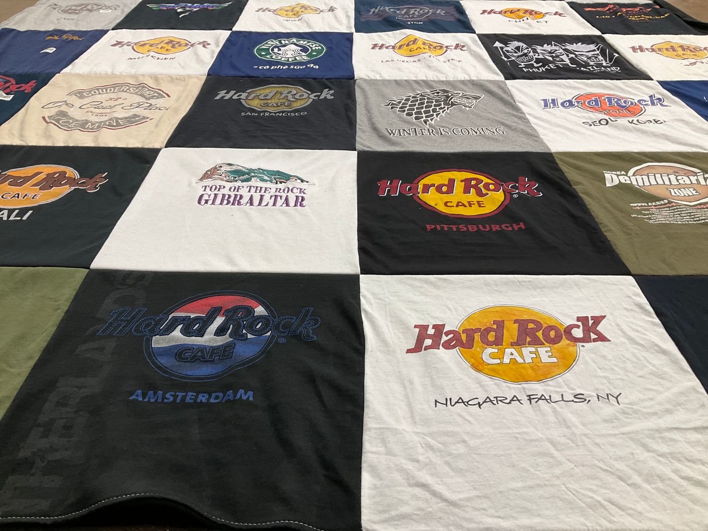 T-shirt quilt with music, restaurants themes by Kathy from TX