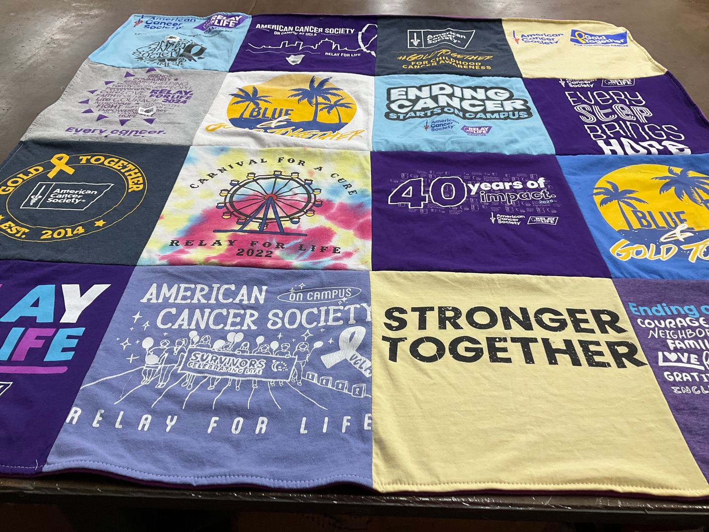 T-shirt quilt with cancer awareness, charity themes by Makenna from AZ